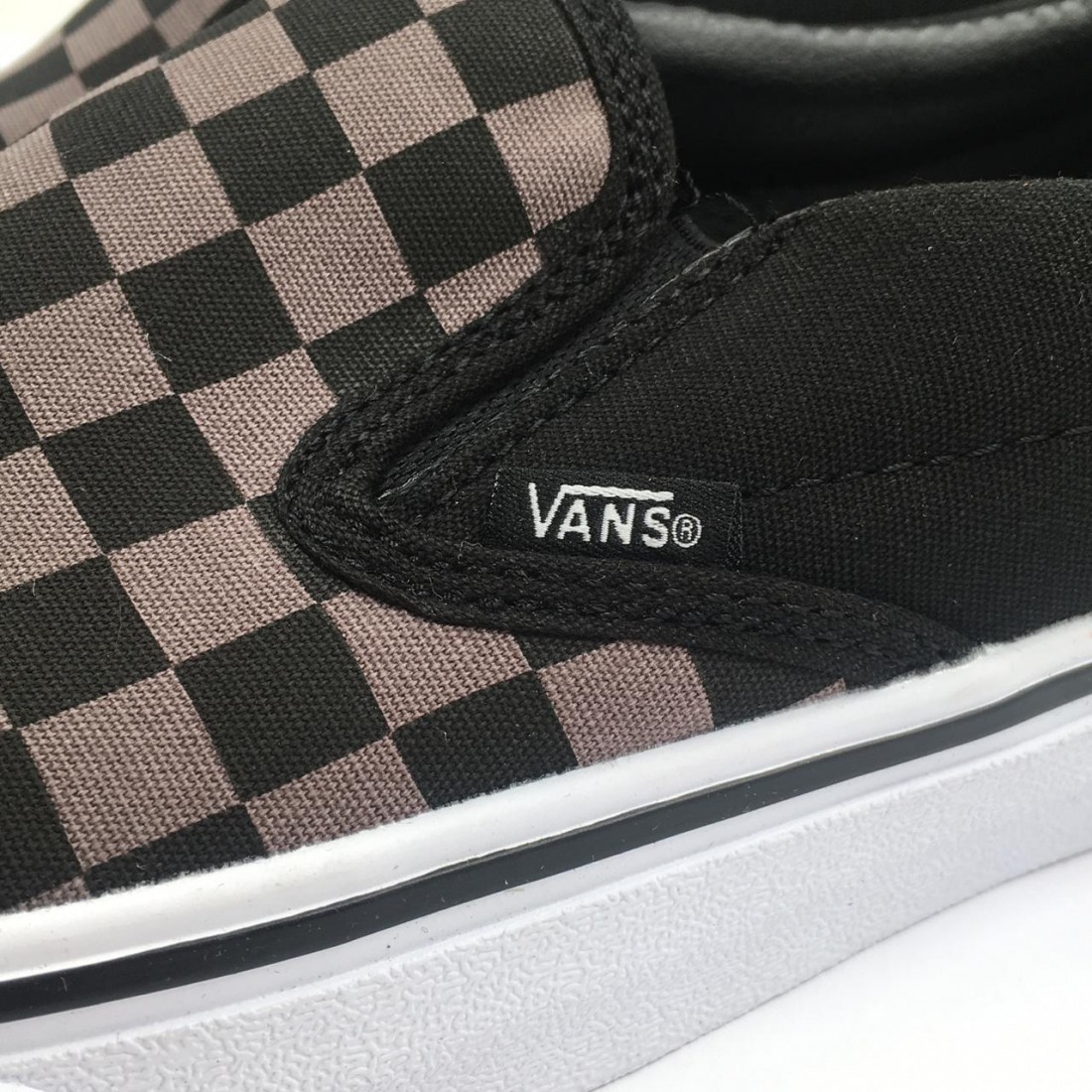black and grey checkerboard vans lace up